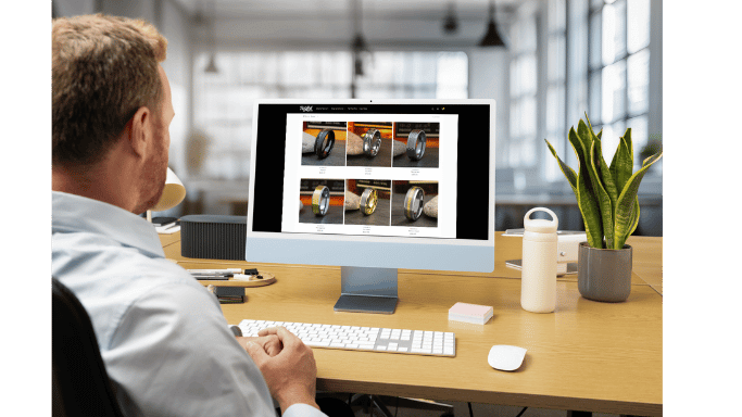 A man choosing a wedding band online