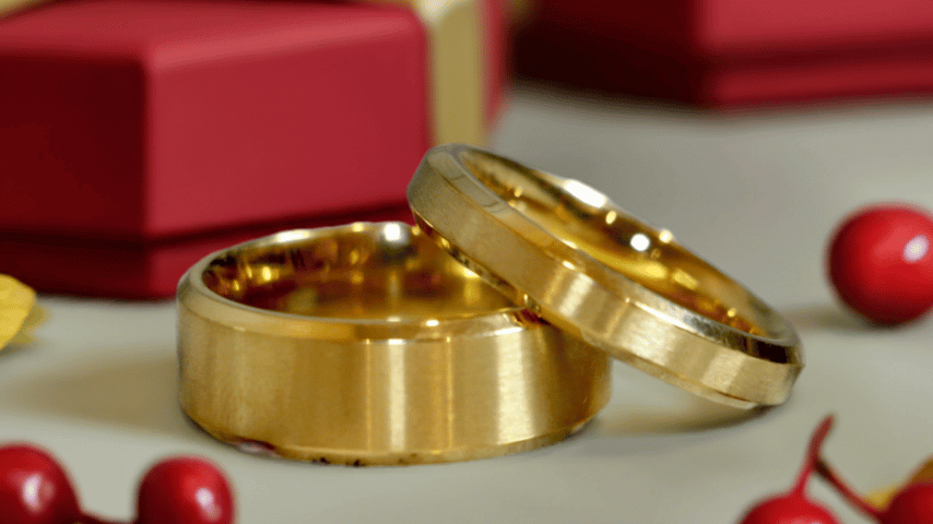 Couple gold steel wedding rings