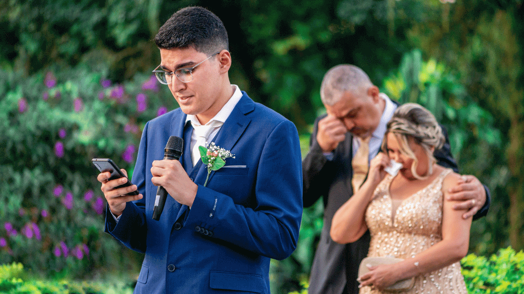 Groom giving heartfelt speech.